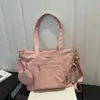 Nova bolsa de tecido de cor sólida transfronteiriça 2026 início do outono elegante grande capacidade alto valor texturizada versátil bolsa de ombro transversal