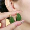 Pendientes nuevos con diseño de nicho que combinan con todo, pequeños, frescos y sencillos, con hebilla de oreja ovalada, esmaltado verde, adecuados para primavera y verano.