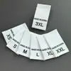 Etiquetas de Talla en Stock al por Mayor Planas de Doble Tejido Etiquetas de Origen con Letras Entrega Directa de Fábrica Accesorios Universales para Ropa