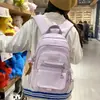 Mochila casual de moda estilo coreano transfronteriza modelo nuevo 2026 bolsa escolar de gran capacidad mochila versátil linda de moda para mujer