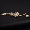 Europa y Estados Unidos superventas anillo de ombligo de acero inoxidable perforado flor gota de agua conjunto anillo de ombligo de circonita Amazon venta al por mayor transfronteriza