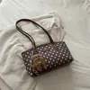 Bolso de mano elegante y versátil para mujer, nueva colección 2026, moderno y chic, adecuado para ir al trabajo, bolso de hombro, diseño de lunares, se puede llevar debajo del brazo