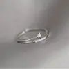 Conjunto de anéis ajustáveis com zircônia em formato de estrela para mulheres, apresentando um design único e estiloso, perfeito para o dedo mindinho ou indicador