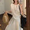 Conjunto casual de dos piezas moderno y versátil para personas petite: conjunto de blusa sin mangas a rayas con amarre y falda
