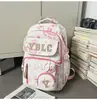 Mochila Nueva de Estilo Coreano Ins de Aspecto Fresco, Dulce y Linda con Dibujos Animados y Letras para Estudiantes de Secundaria Mochila Ligera
