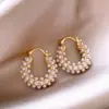 Pendientes geométricos de perlas y circonitas transfronterizos europeos y americanos, pendientes exquisitos de nicho de lujo ligero de alta gama, accesorios para orejas simples y elegantes para mujer