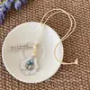 Colar estilo boêmio com conchas e estrelas-do-mar, refrescante para o verão, adequado para usar em camadas, requintado e de nicho, versátil para viagens e férias