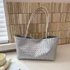 Bolsa de mano estilo coreano retro al por mayor para mujer 2026 Otoño Nuevo Color Sólido Tejida de un solo hombro Bolso para el trabajo Bolso de axila