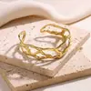 Europeo y Americano Textura Exagerada Flor Dorada Hueco Exagerado Pulsera Ancha Acero Inoxidable Abierta Gama Alta Acero de Titanio Mujer