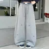 Calça pantalona xadrez patchwork para meninas, novo estilo outono, calça de moletom infantil folgada com bordado de laço, calça casual para crianças maiores