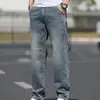 Jeans Masculino Versátil Tendência Marca Nova Primavera e Outono, Calças Retas Casuais de Negócios Masculinas Stretch Largas