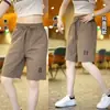 Comercio exterior playa casual seda de hielo verano delgado abrigo moda suelto talla grande pantalones cortos deportivos para hombre