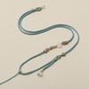 Cuerda de loto Ruyi con colgante de jade hetiano dorado y jade tejido a mano para hombres y mujeres.