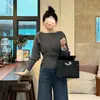 Suéter de Tricô Batwing Suave Estilo Chanel Outono/Inverno 2026 para Mulheres, Macio e Amassado, Top Base Ajustado na Cintura, Tendência