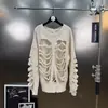 Otoño Temprano 2025 Nuevo Cuello Redondo Manga Larga Diseño de Agujeros Calados Nicho Holgado Aspecto Adelgazante Tejido