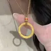 Loja de ouro com alta retenção de cor método antigo ouro de areia nazha com pingente de anel Gankun esmalte anel Gankun fivela de paz mulheres