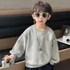 Sudadera de otoño de manga larga para niños 2026 nuevo estilo moda coreana de moda camiseta básica para niños ropa de primavera y otoño