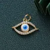 Colgante de joyería de ojo de diablo con incrustaciones de diamantes nuevo transfronterizo llavero DIY mochila colgante Joker en stock al por mayor