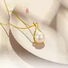Moderna y elegante bolsa de la fortuna con cuentas redondas, collar tipo bolsa de la fortuna imitación jade Hetian para mujer, cadena para la clavícula personalizada de nicho de lujo ligero, diseño nuevo, simple y versátil
