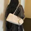 Bolso de hombro para mujer, nuevo otoño color liso 2026, bolso simple de gran capacidad, moderno, casual, a la moda, versátil