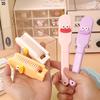 Nuevo mini peine plegable de dibujos animados lindo para estudiantes, peine de masaje para el cabello, peine pequeño portátil, parche para manualidades