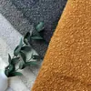 Venta al por mayor del fabricante Tela de hilo de bucle versátil Material de algodón lino DIY Tapicería suave Cojín de color sólido Funda de coche Tela para sofá