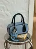 Nova bolsa de mão jeans feminina transfronteiriça, bolsa pequena vintage, bolsa de ombro versátil, bolsa transversal fashion, bolsa de axila estilosa