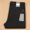 Pantalones casuales de otoño e invierno para hombre, nuevos, de algodón Tencel, de cintura media, elásticos, gruesos de otoño, sin planchar, antiarrugas, simples, de negocios, rectos