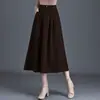 Falda de lana línea A 2026 otoño e invierno cintura alta nueva corte ajustado estilo Hepburn longitud media casual