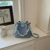 Bolso tipo cubo de alta apariencia 2026 Verano Nuevo de Moda Bolso Cruzado de Cadena Nicho Estilo Relajado Bolso de Mano de Color Sólido