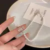 Colar Delicado de Pérolas com Laço para Mulheres, Design de Nicho de Luxo Leve, Corrente para Clavícula, Acessório de Pescoço Elegante e Sofisticado