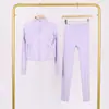 Conjunto Lulu Df de Jaqueta Curta com Gola Alta e Calça Cropped com Etiqueta, Em Estoque Envio Direto, Gola Alta Slim Fit, Zíper Dourado Elástico