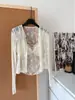 Conjunto de Dos Piezas para Niña: Chaleco/Cárdigan de Malla Jacquard de Encaje Dulce y Puro + Falda de Lunares Color Café con Copas en el Pecho