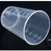 Taza medidora pequeña de plástico 50ml taza graduada herramienta para hornear taza de empaque taza medidora de laboratorio engrosada taza de jarabe de pp