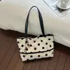 Bolsa de ombro da moda com poá 2026, bolsa de trabalho transfronteiriça, bolsa de axila estilosa de nicho para primavera-verão