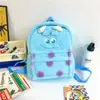 Mochila escolar de grande capacidade engraçada tridimensional de urso de desenho animado 2023 nova mochila de pelúcia fofa de coração para meninas estudantes universitários