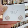 Brincos de pedra olho de gato de moda simples com quatro folhas de flor, estilo coreano feminino, design, sentido, zircônia, pétala, brincos de pino de prata, brincos de celebrante da Internet