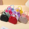 2025 Verano Nuevo PVC Jelly Shell Bag Mini Bolso Bolso de Mano Trendy Explosivo Un Solo Hombro Cruzado Bolso de Mujer