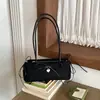 Bolso de Hombro Estilo Coreano Súper Popular de Nicho con Lazo para Mujer Otoño Retro Simple para el Trabajo Sensación de Alta Gama Bolso Baguette de Hombro Único