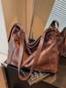 Bolsa Retrô de Grande Capacidade Transfronteiriça para Mulheres Novo Estilo Outono e Inverno 2026 Bolsa de Ombro Tote Versátil e Fashionável Bolsa Transversal
