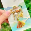 Regalo del Templo Cultural y Creativo del Año Nuevo del Caballo: Pin de Lista Dorada, Pluma Wenchang, Colgante Adorno Calmante para Bebé