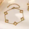 Conjunto de Collar y Pulsera de Acero Inoxidable Hueco de Cuatro Hojas de Nuevo Estilo Transfronterizo para Mujer, Conjunto de Cuatro Hojas de Moda y Versátil al por Mayor