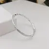 Pulsera de bambú brillante moda mujer todo-partido sólido joven simple push-pull pulsera lisa para madre venta al por mayor