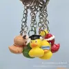 Chaveiro Pingente Criativo Variado Pato Amarelo Resina Pato Presente de Formatura Estudante Caixa Surpresa Buraco Música