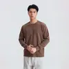 Además, la camiseta de manga larga de otoño 2026 para hombre presenta una textura de rayas verticales, un estilo simple y maduro, y está hecha de algodón.