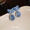 Pendientes colgantes de lazo de cristal artificial con incrustaciones de aguja de plata con diamantes, pendientes elegantes de nicho de lujo accesible coreano, pendientes populares