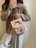 Mochila versátil de moda de principios de otoño, con lazo, para estudiantes, bolsa escolar, mochila pequeña para viajes y desplazamientos