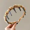 Acessórios de Cabelo Femininos Outono/Inverno 2025 Estilo Coreano Retrô Estampa de Leopardo Denteado Faixa de Cabelo Acolchoada Antiderrapante para Lavar o Rosto Presilha de Cabelo Faixa para Maquiagem