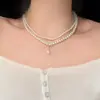 Colar Francês Retro de Pérolas com Dupla Camada e Pequenos Acessórios de Miçangas de Arroz para Mulheres, Gargantilha de Luxo de Alta Qualidade, Corrente de Clavícula de Nicho para Mulheres