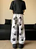 Jeans com Graffiti de Palmeiras High Street Americano Design 2025 para Homens e Mulheres, Marca Moderna Bonito Calças Brancas de Perna Larga Retas